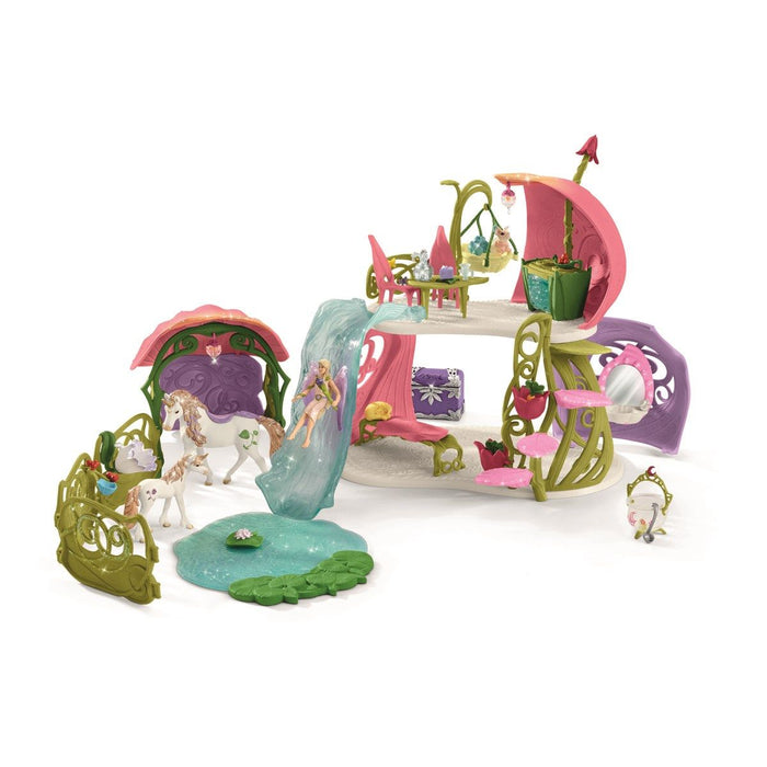 Schleich 42445 Kimaltava kukkaistalo, yksisarviset, järvi ja talli